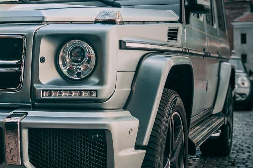 Headlight, indicator and wheel arch detail of the silver G 63