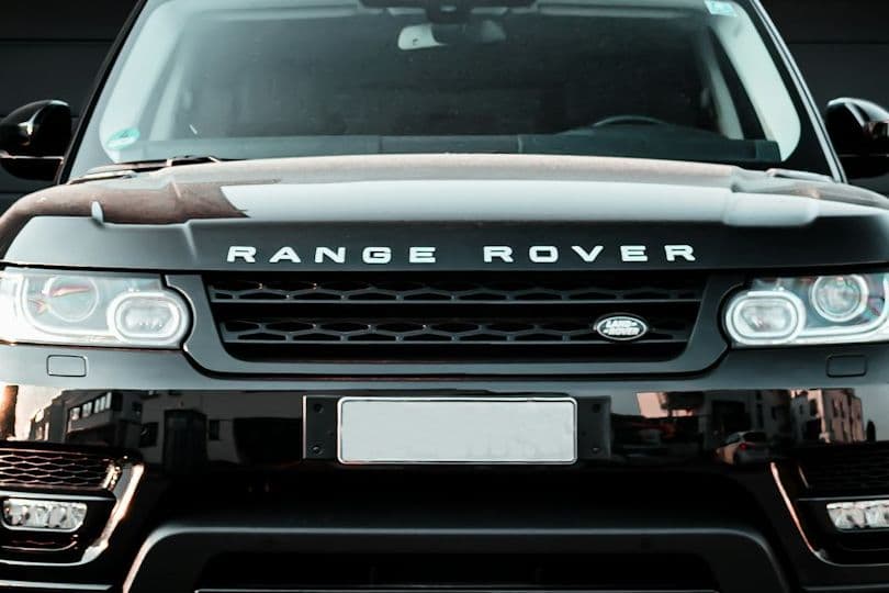Front view of the black Range Rover Sport bonnet lettering and grille