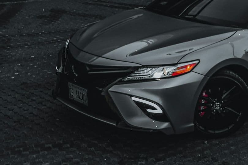 Front three-quarter view of the grey Toyota Camry